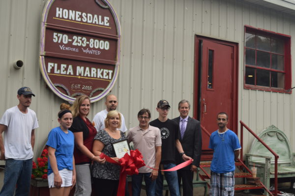 Pictured in photo are Scott O’Dell, Michael Acevedo and Elijah Hanson – employees; Stephen Cable and Catherine MacAdam – Cable’s Hot Dogs; Jim Gremli – owner; Lew Critelli,  Jennifer DeYoung and Debbie Gillette – The Chamber of the Northern Poconos